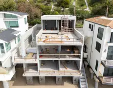 Kanye West’s gutted Malibu ‘bunker’ relists for $35 million as it preps for rebuild
